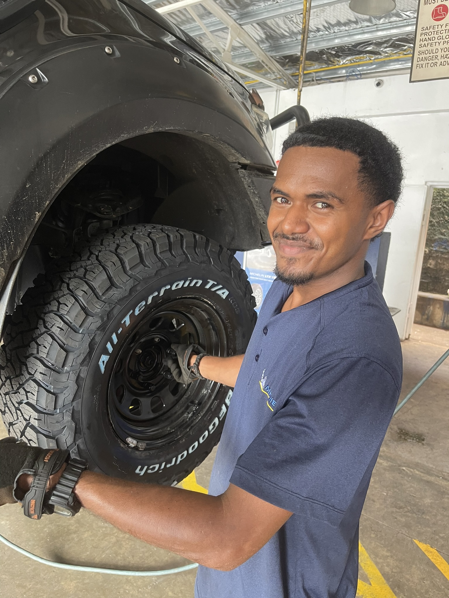 Tyreline technician fitting BFGoodrich All-Terrain T/A KO3 tyre